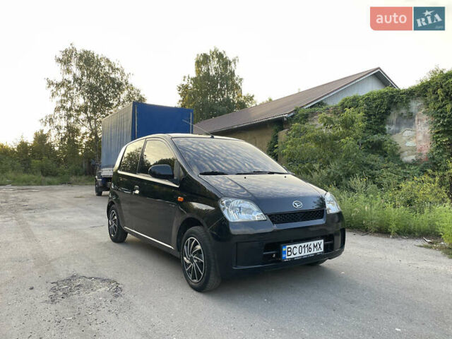 Чорний Дайхатсу Cuore, об'ємом двигуна 0.99 л та пробігом 185 тис. км за 3200 $, фото 1 на Automoto.ua