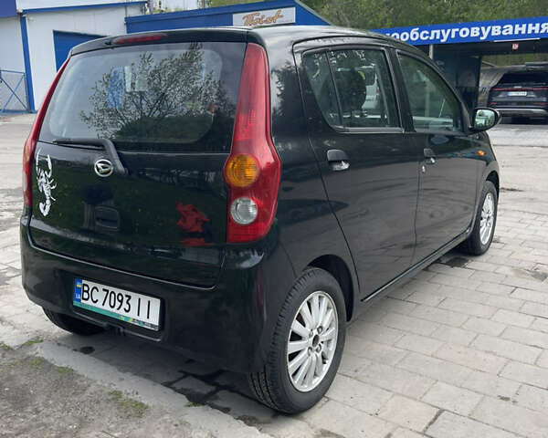Чорний Дайхатсу Cuore, об'ємом двигуна 1 л та пробігом 164 тис. км за 3600 $, фото 3 на Automoto.ua