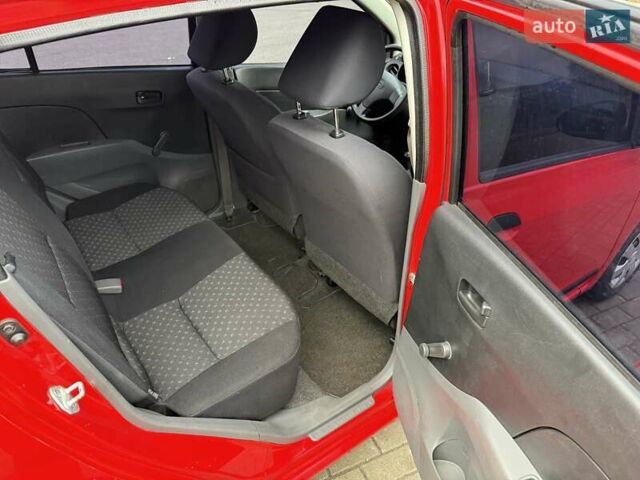 Красный Дайхатсу Куоре, объемом двигателя 1 л и пробегом 205 тыс. км за 2900 $, фото 14 на Automoto.ua
