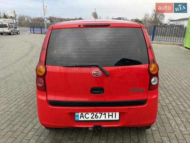 Красный Дайхатсу Куоре, объемом двигателя 1 л и пробегом 205 тыс. км за 2900 $, фото 6 на Automoto.ua