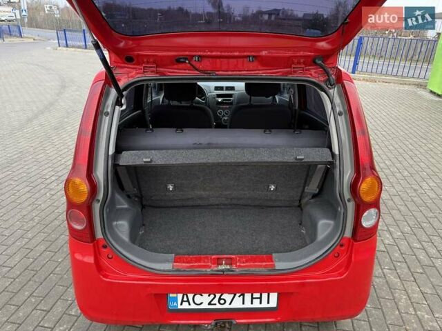 Красный Дайхатсу Куоре, объемом двигателя 1 л и пробегом 205 тыс. км за 2900 $, фото 17 на Automoto.ua
