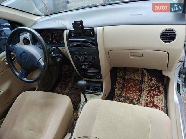 Серый Дайхатсу Куоре, объемом двигателя 0.99 л и пробегом 201 тыс. км за 4200 $, фото 10 на Automoto.ua