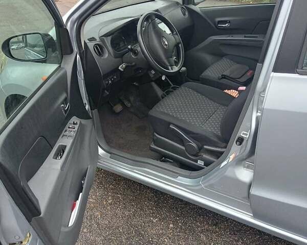 Серый Дайхатсу Куоре, объемом двигателя 1 л и пробегом 218 тыс. км за 5200 $, фото 1 на Automoto.ua