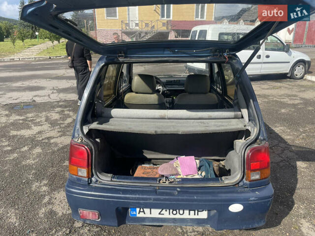 Синий Дайхатсу Куоре, объемом двигателя 0.85 л и пробегом 73 тыс. км за 1400 $, фото 9 на Automoto.ua
