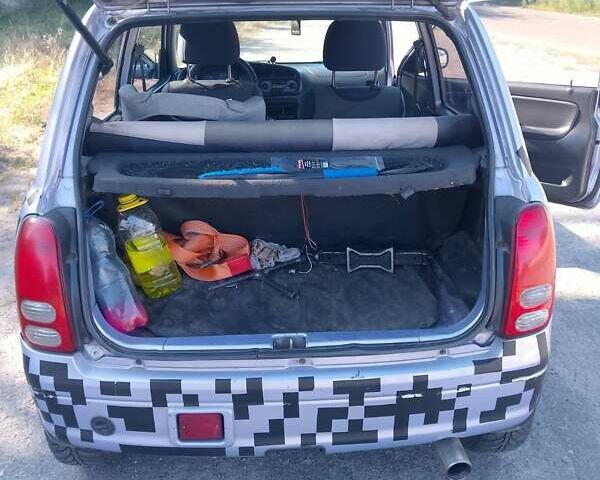 Синій Дайхатсу Cuore, об'ємом двигуна 0.99 л та пробігом 157 тис. км за 2200 $, фото 5 на Automoto.ua