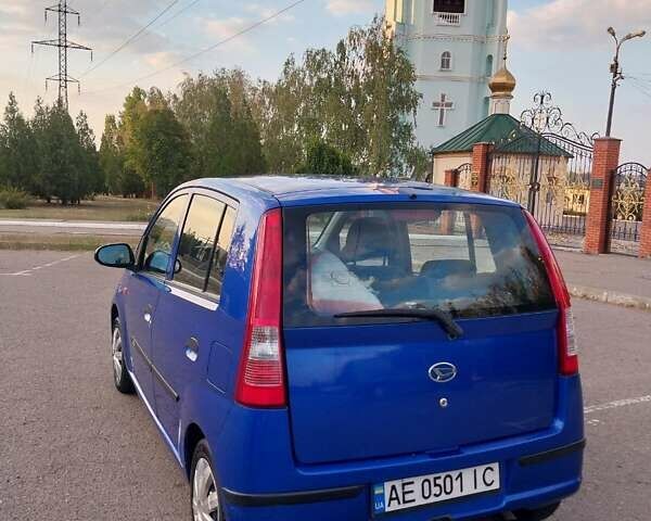 Синий Дайхатсу Куоре, объемом двигателя 0.99 л и пробегом 127 тыс. км за 3950 $, фото 1 на Automoto.ua