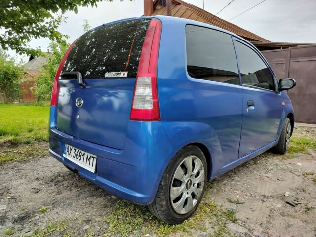 Синий Дайхатсу Куоре, объемом двигателя 1 л и пробегом 210 тыс. км за 2700 $, фото 1 на Automoto.ua