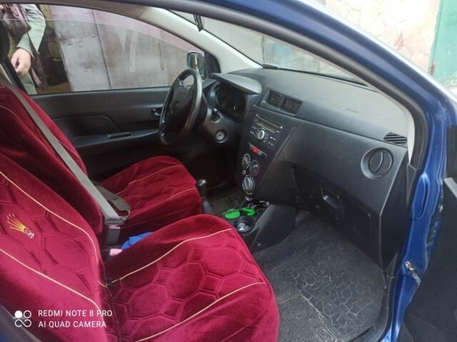 Синий Дайхатсу Куоре, объемом двигателя 1 л и пробегом 112 тыс. км за 4300 $, фото 4 на Automoto.ua