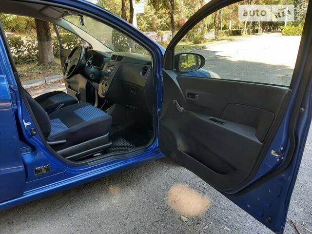 Синий Дайхатсу Куоре, объемом двигателя 1 л и пробегом 157 тыс. км за 4150 $, фото 25 на Automoto.ua