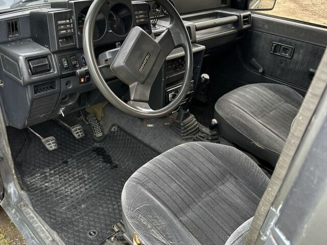 Серый Дайхатсу Роки, объемом двигателя 2.8 л и пробегом 300 тыс. км за 5500 $, фото 6 на Automoto.ua