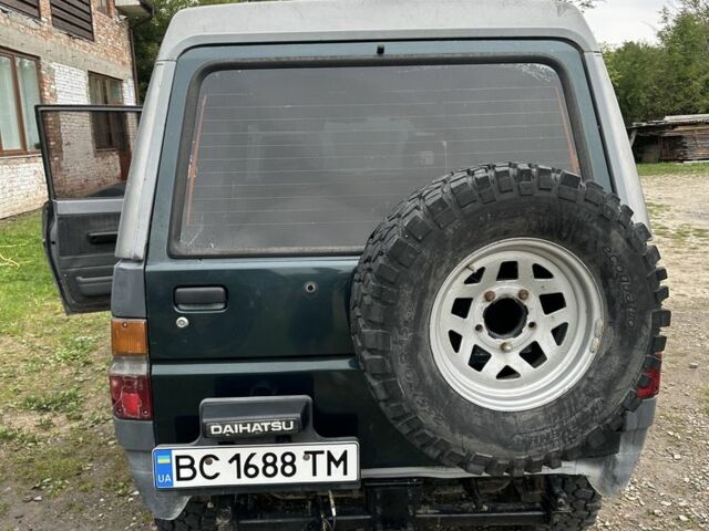 Серый Дайхатсу Роки, объемом двигателя 2.8 л и пробегом 300 тыс. км за 5500 $, фото 4 на Automoto.ua
