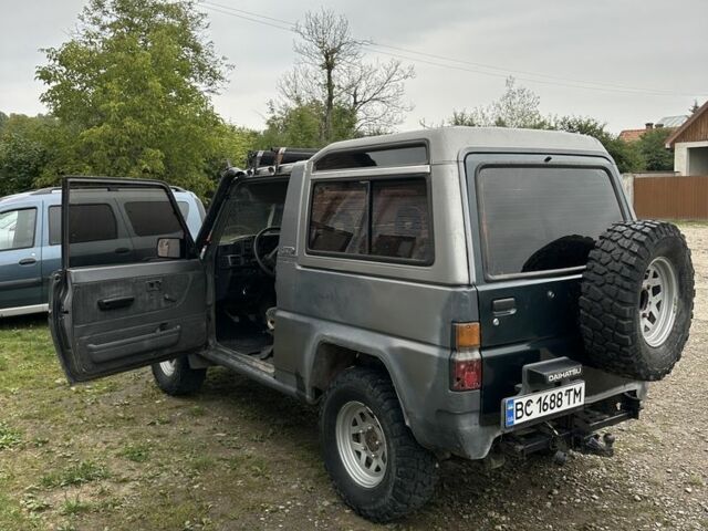 Серый Дайхатсу Роки, объемом двигателя 2.8 л и пробегом 300 тыс. км за 5500 $, фото 5 на Automoto.ua