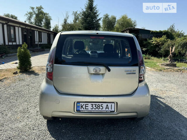 Бежевий Дайхатсу Sirion, об'ємом двигуна 1.3 л та пробігом 300 тис. км за 3900 $, фото 4 на Automoto.ua