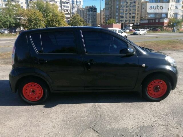 Чорний Дайхатсу Sirion, об'ємом двигуна 1 л та пробігом 135 тис. км за 4000 $, фото 21 на Automoto.ua