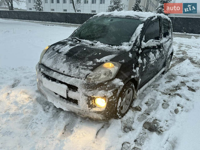 Чорний Дайхатсу Sirion, об'ємом двигуна 1.3 л та пробігом 159 тис. км за 5900 $, фото 3 на Automoto.ua