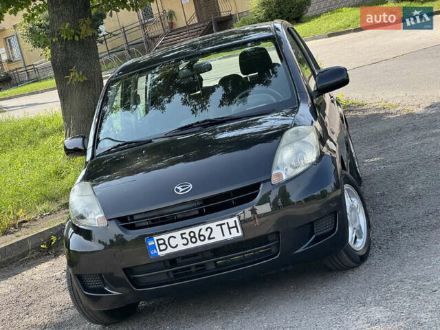 Чорний Дайхатсу Sirion, об'ємом двигуна 1 л та пробігом 116 тис. км за 5299 $, фото 14 на Automoto.ua