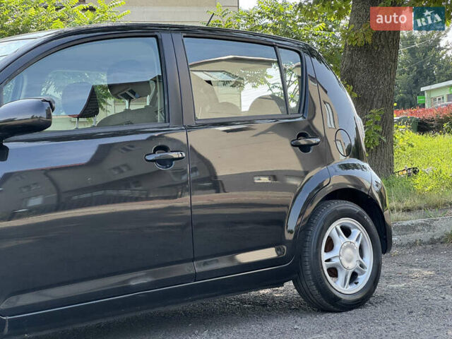 Чорний Дайхатсу Sirion, об'ємом двигуна 1 л та пробігом 116 тис. км за 4200 $, фото 11 на Automoto.ua
