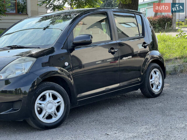 Чорний Дайхатсу Sirion, об'ємом двигуна 1 л та пробігом 116 тис. км за 5299 $, фото 4 на Automoto.ua