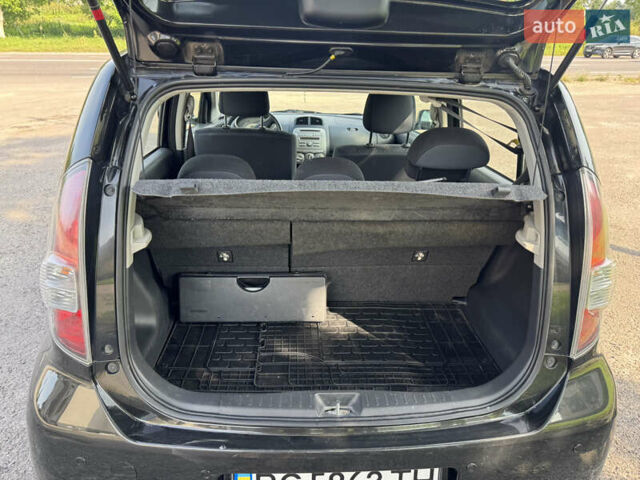 Чорний Дайхатсу Sirion, об'ємом двигуна 1 л та пробігом 116 тис. км за 5299 $, фото 25 на Automoto.ua