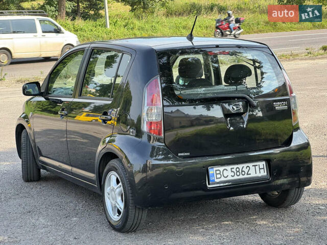 Чорний Дайхатсу Sirion, об'ємом двигуна 1 л та пробігом 116 тис. км за 5299 $, фото 6 на Automoto.ua
