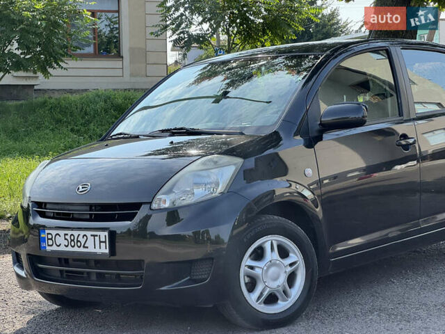 Чорний Дайхатсу Sirion, об'ємом двигуна 1 л та пробігом 116 тис. км за 5299 $, фото 2 на Automoto.ua