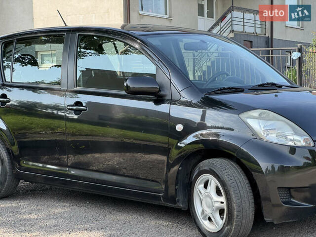 Чорний Дайхатсу Sirion, об'ємом двигуна 1 л та пробігом 116 тис. км за 5299 $, фото 13 на Automoto.ua