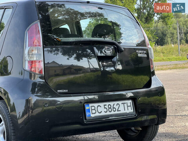 Чорний Дайхатсу Sirion, об'ємом двигуна 1 л та пробігом 116 тис. км за 5299 $, фото 8 на Automoto.ua