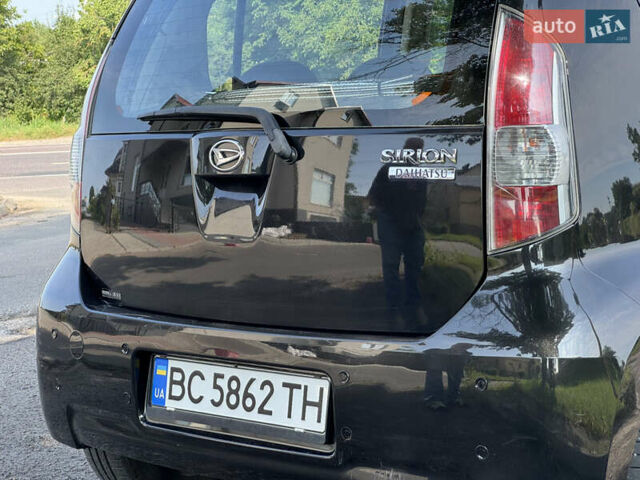 Чорний Дайхатсу Sirion, об'ємом двигуна 1 л та пробігом 116 тис. км за 5299 $, фото 10 на Automoto.ua