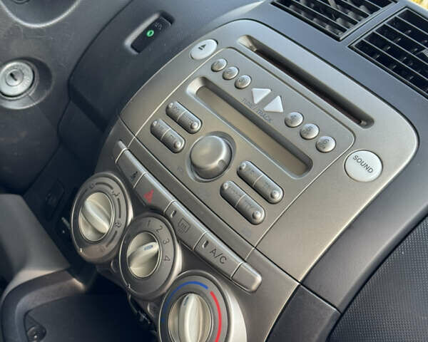 Черный Дайхатсу Сирион, объемом двигателя 1 л и пробегом 116 тыс. км за 3700 $, фото 29 на Automoto.ua