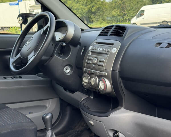 Черный Дайхатсу Сирион, объемом двигателя 1 л и пробегом 116 тыс. км за 3700 $, фото 28 на Automoto.ua