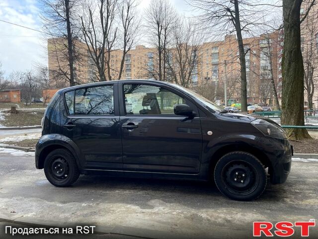 Чорний Дайхатсу Sirion, об'ємом двигуна 1.3 л та пробігом 211 тис. км за 4250 $, фото 1 на Automoto.ua