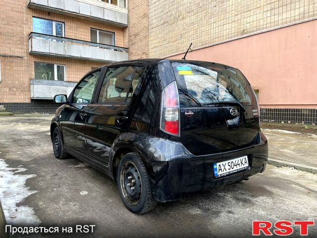 Чорний Дайхатсу Sirion, об'ємом двигуна 1.3 л та пробігом 211 тис. км за 4250 $, фото 3 на Automoto.ua