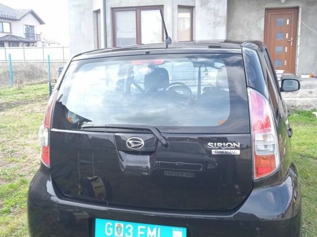 Чорний Дайхатсу Sirion, об'ємом двигуна 1 л та пробігом 166 тис. км за 4200 $, фото 21 на Automoto.ua