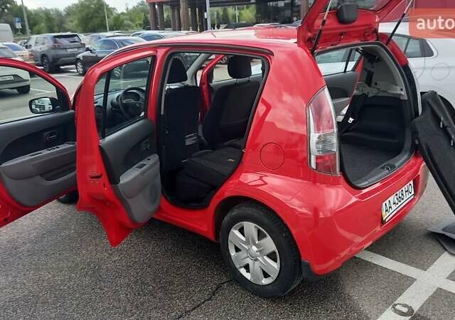 Красный Дайхатсу Сирион, объемом двигателя 1.3 л и пробегом 187 тыс. км за 5700 $, фото 1 на Automoto.ua