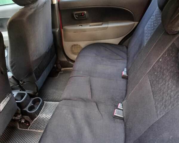 Червоний Дайхатсу Sirion, об'ємом двигуна 1.3 л та пробігом 251 тис. км за 4100 $, фото 9 на Automoto.ua