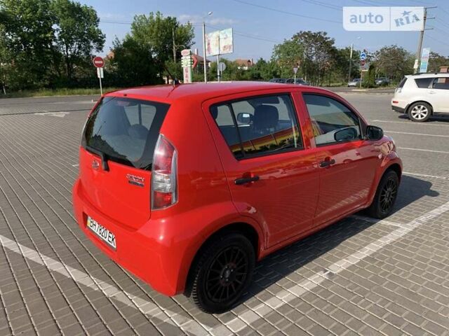 Червоний Дайхатсу Sirion, об'ємом двигуна 1 л та пробігом 79 тис. км за 5599 $, фото 8 на Automoto.ua