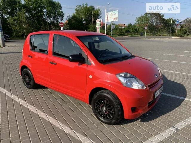 Червоний Дайхатсу Sirion, об'ємом двигуна 1 л та пробігом 79 тис. км за 5599 $, фото 7 на Automoto.ua