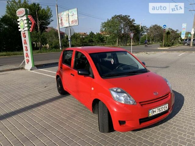 Червоний Дайхатсу Sirion, об'ємом двигуна 1 л та пробігом 79 тис. км за 5599 $, фото 15 на Automoto.ua