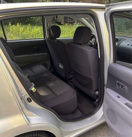 Серый Дайхатсу Сирион, объемом двигателя 1 л и пробегом 212 тыс. км за 4150 $, фото 5 на Automoto.ua