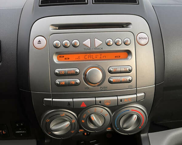 Серый Дайхатсу Сирион, объемом двигателя 1 л и пробегом 214 тыс. км за 4150 $, фото 14 на Automoto.ua