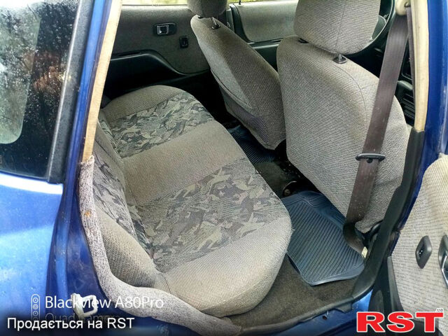 Синий Дайхатсу Сирион, объемом двигателя 1 л и пробегом 300 тыс. км за 1190 $, фото 4 на Automoto.ua