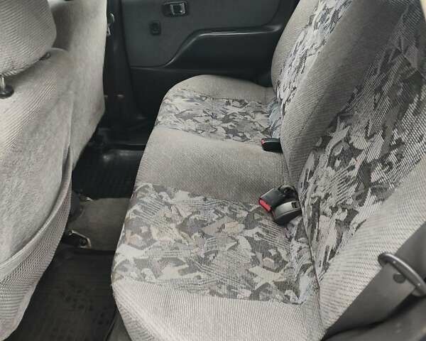 Синий Дайхатсу Сирион, объемом двигателя 0.99 л и пробегом 249 тыс. км за 2750 $, фото 12 на Automoto.ua