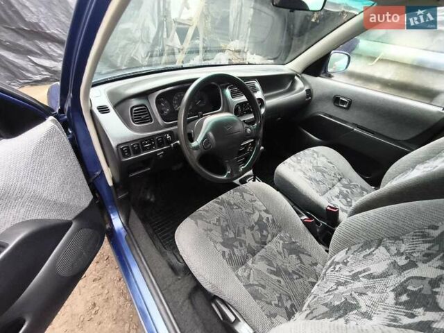 Синий Дайхатсу Сирион, объемом двигателя 0.99 л и пробегом 249 тыс. км за 2750 $, фото 10 на Automoto.ua