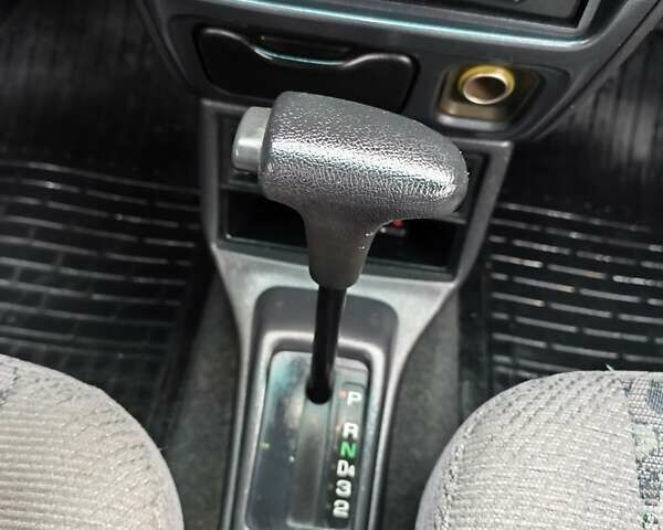 Синий Дайхатсу Сирион, объемом двигателя 0.99 л и пробегом 249 тыс. км за 2750 $, фото 16 на Automoto.ua