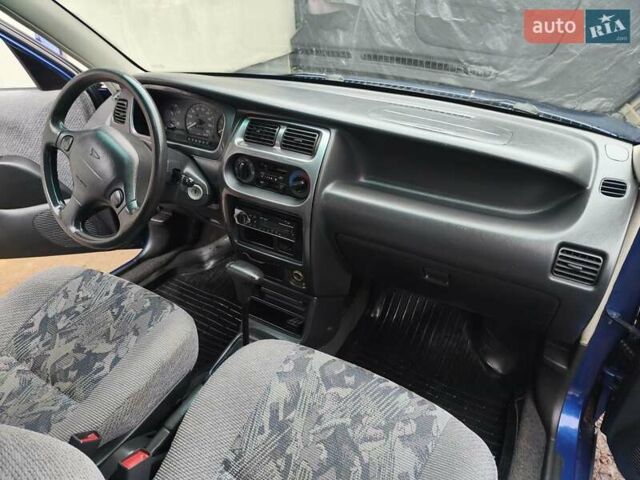 Синий Дайхатсу Сирион, объемом двигателя 0.99 л и пробегом 249 тыс. км за 2750 $, фото 18 на Automoto.ua