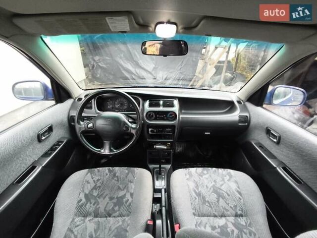 Синий Дайхатсу Сирион, объемом двигателя 0.99 л и пробегом 249 тыс. км за 2750 $, фото 9 на Automoto.ua