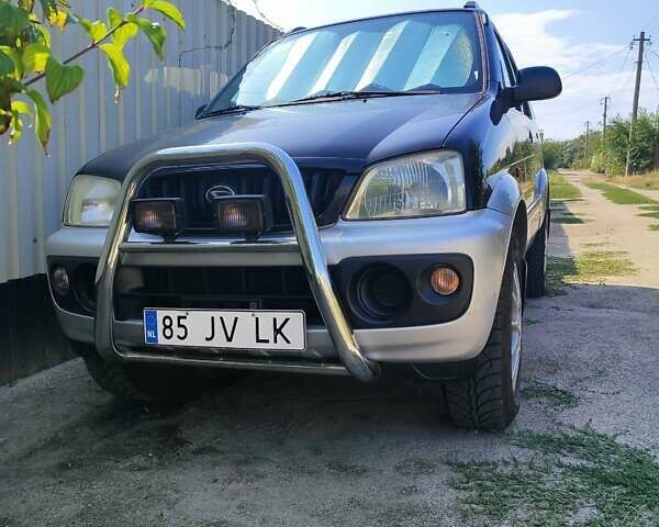 Чорний Дайхатсу Terios, об'ємом двигуна 1.3 л та пробігом 385 тис. км за 2300 $, фото 6 на Automoto.ua