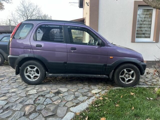 Фиолетовый Дайхатсу Териос, объемом двигателя 1.3 л и пробегом 300 тыс. км за 2500 $, фото 3 на Automoto.ua