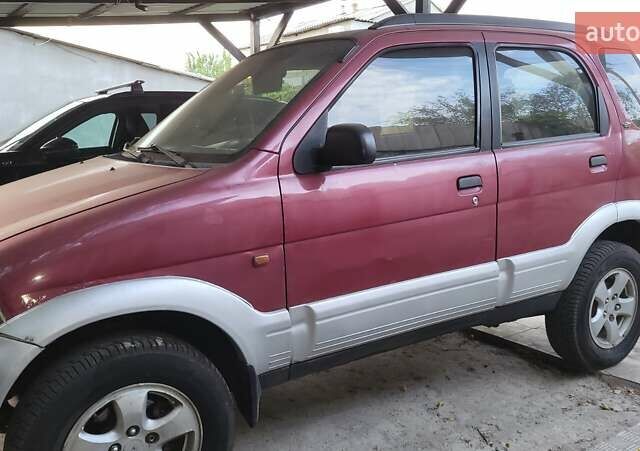 Дайхатсу Териос 1997 в Харькове на Automoto.ua Красный Дайхатсу Териос, объемом двигателя 1.3 л и пробегом 198 тыс. км за 3200 $, фото 3 на Automoto.ua