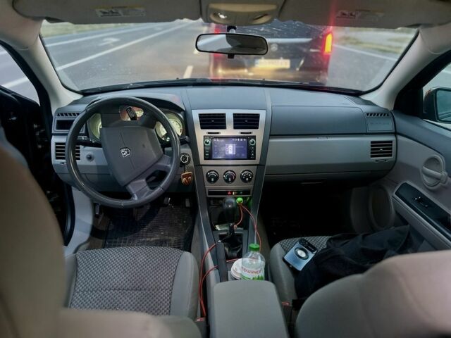 Черный Додж Авенджер, объемом двигателя 2 л и пробегом 250 тыс. км за 4399 $, фото 6 на Automoto.ua